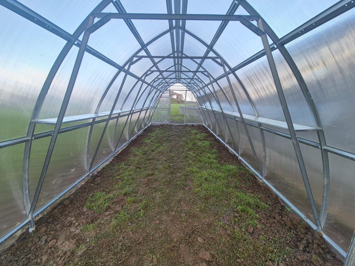 SKY greenhouse interior with shelf supports